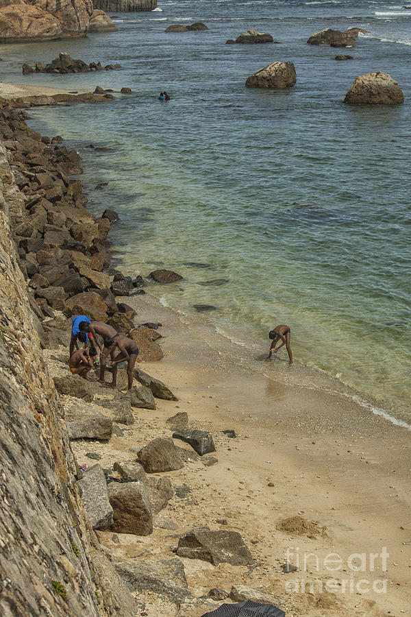 Boys at the beach in Galle, Sri Lanka Photograph by Patricia Hofmeester