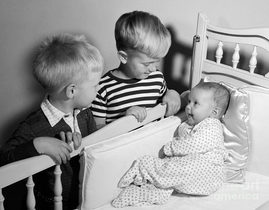 Boys Looking At Baby Sister, C.1950s Photograph by Debrocke/ClassicStock