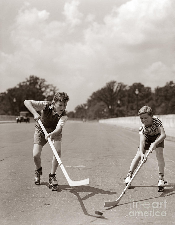 Boys Playing Street Hockey, C. 1930s Photograph by H. Armstrong Roberts/ClassicStock