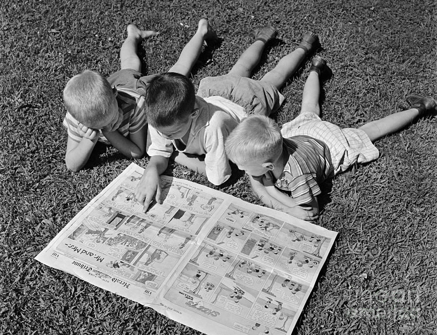 Boys Reading Newspaper Comics, C.1950s Photograph by G. Hampfler/ClassicStock