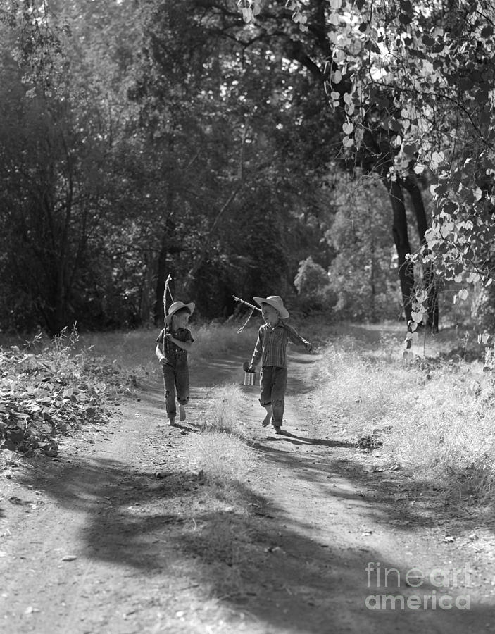 Boys Running In Woods Photograph by Pound/ClassicStock