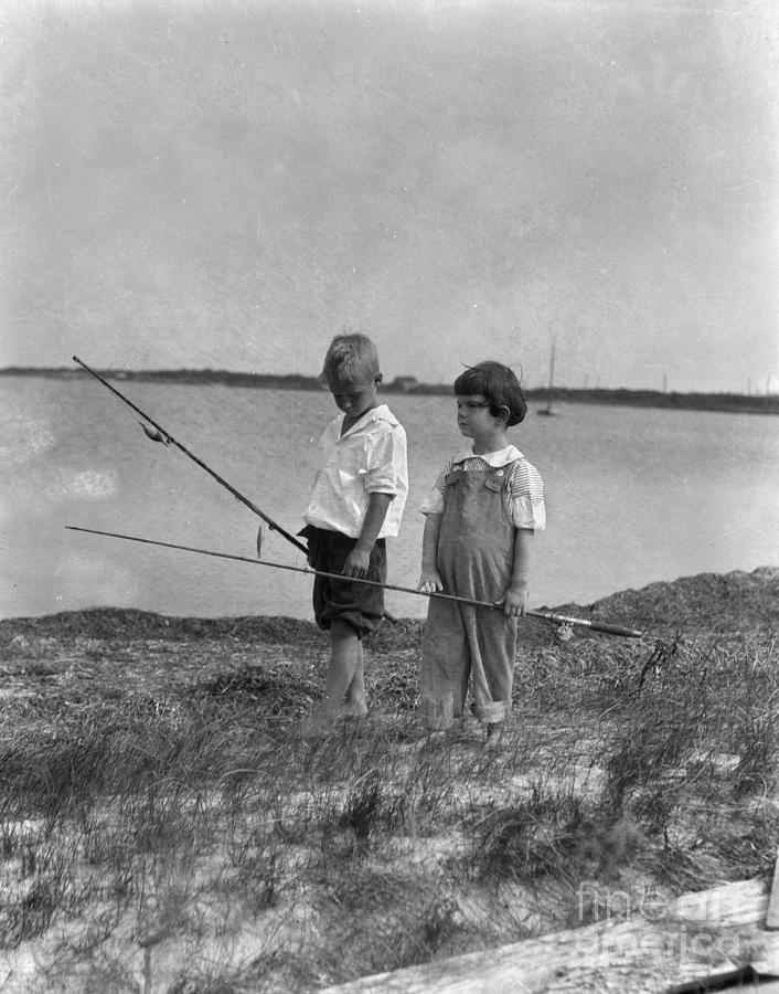 Boys Walking Along Shore With Fishing Photograph by H Armstrong Roberts and ClassicStock