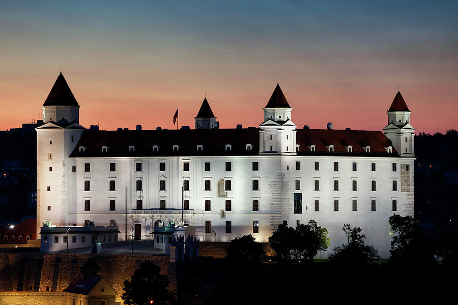 Bratislava Castle Illuminated at Dusk in Slovakia Photograph by Artur Bogacki
