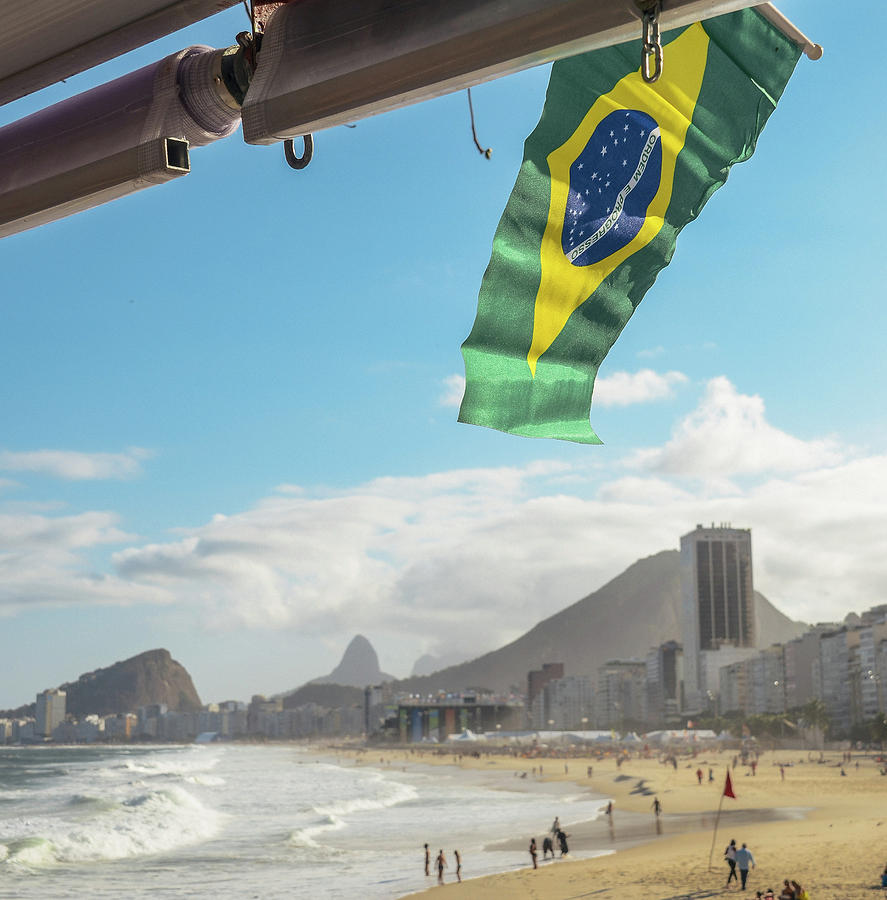 Soccer Photograph - Brazilian flag at Copacabana, Rio de Janeiro, Brazil by Alexandre Rotenberg