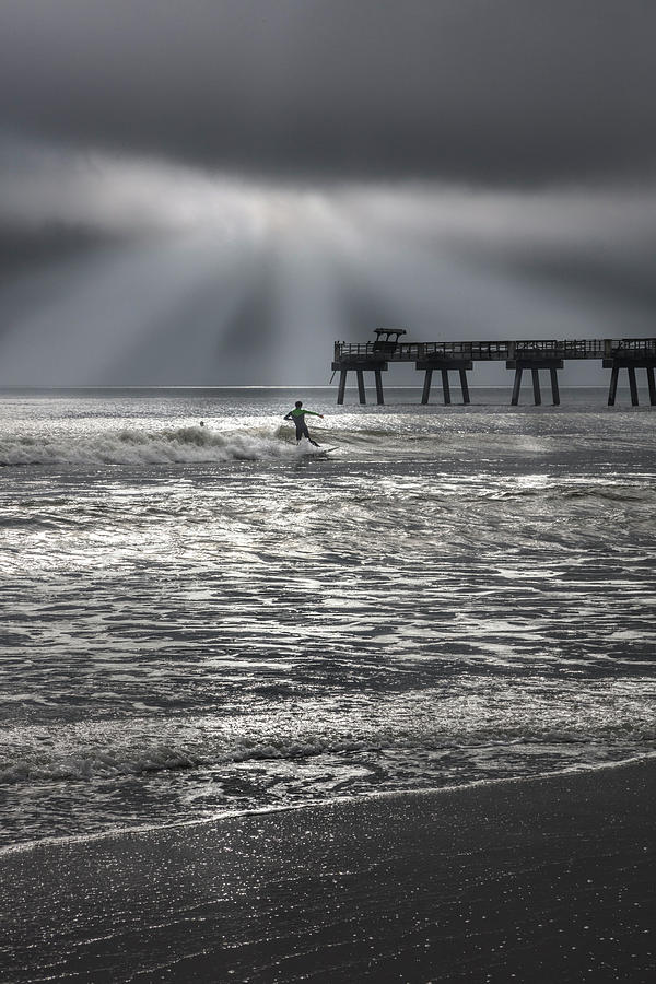 Breaking Through on the Surf Photograph by Debra and Dave Vanderlaan