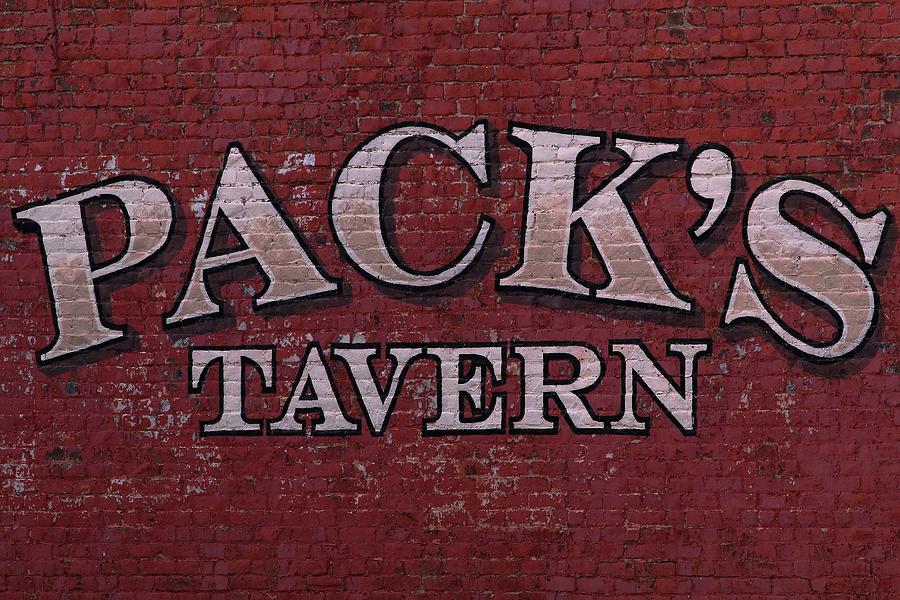 Brick Painted Packs Tavern Photograph by Carol Montoya