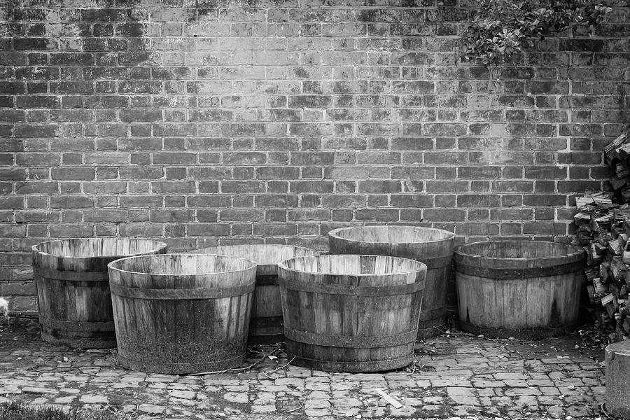 Brick Wall and Barrels B W Photograph by Teresa Mucha