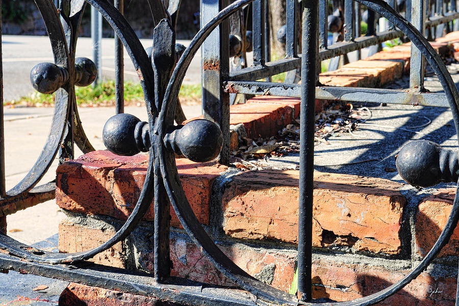 Bricks and Wrought Iron Photograph by Paulette B Wright