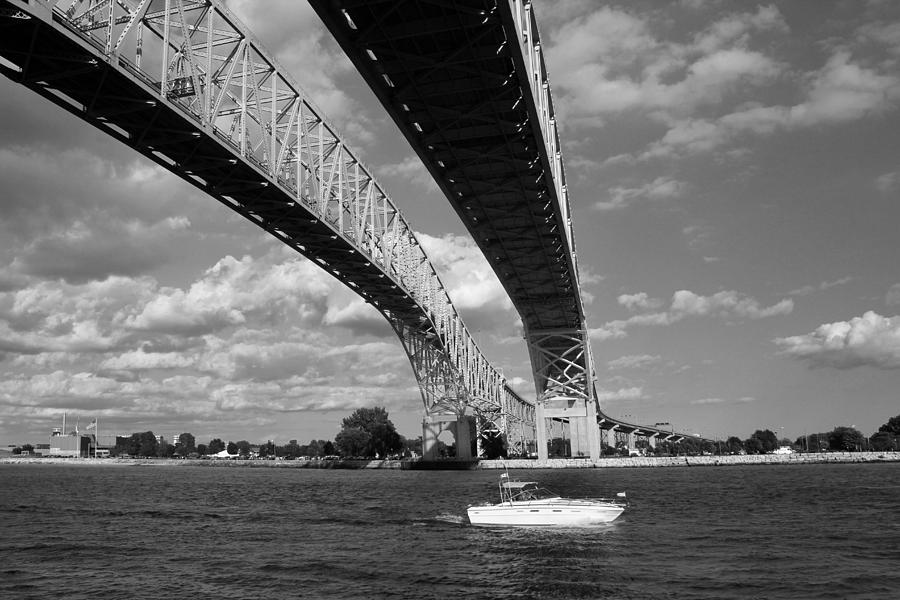 Bridge and Boat BW Photograph by Mary Bedy