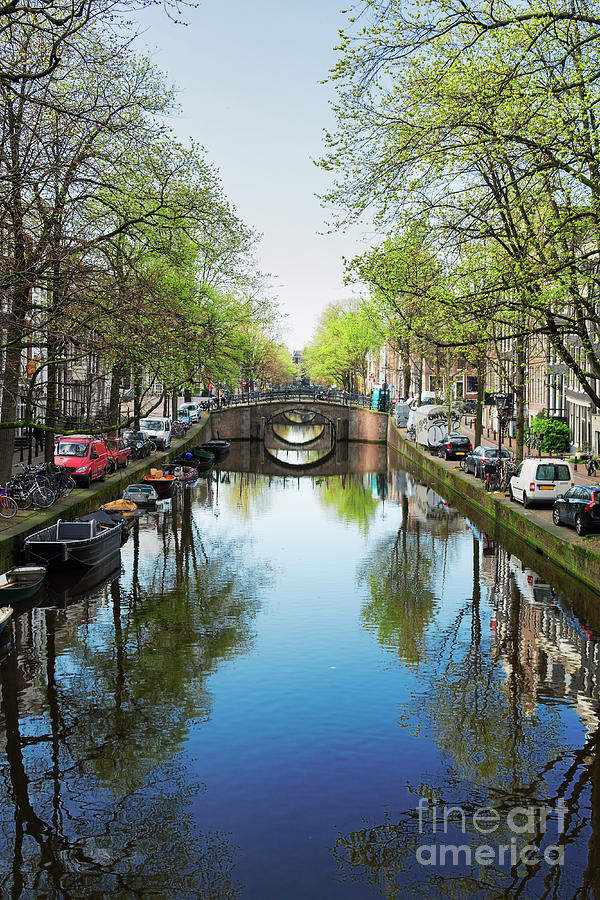 Bridge and Reflections of Amsterdam Photograph by Anastasy Yarmolovich