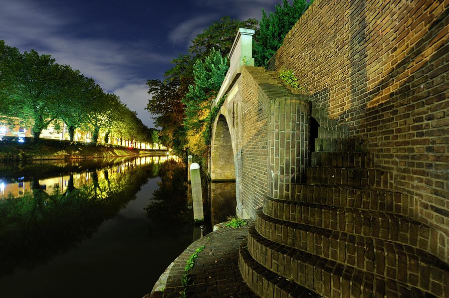 Bridge Bijlhouwersbrug and canal Catharijnesingel in Utrecht at dusk 267 Photograph by Merijn Van der Vliet