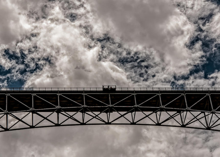 Black And White Photograph - Bridge From Below by Britt Runyon