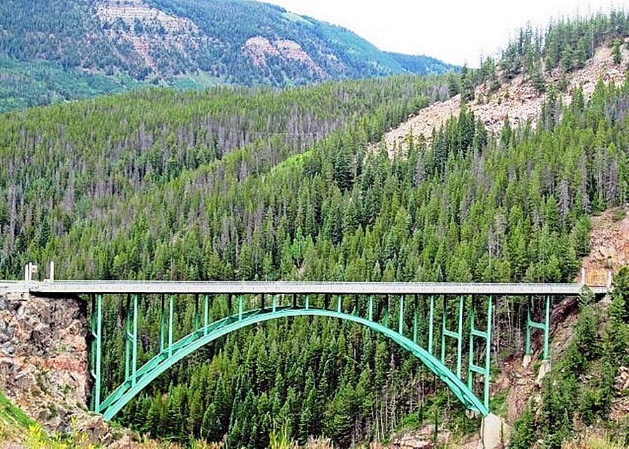 Bridge in the Rockies Photograph by Mary Pille