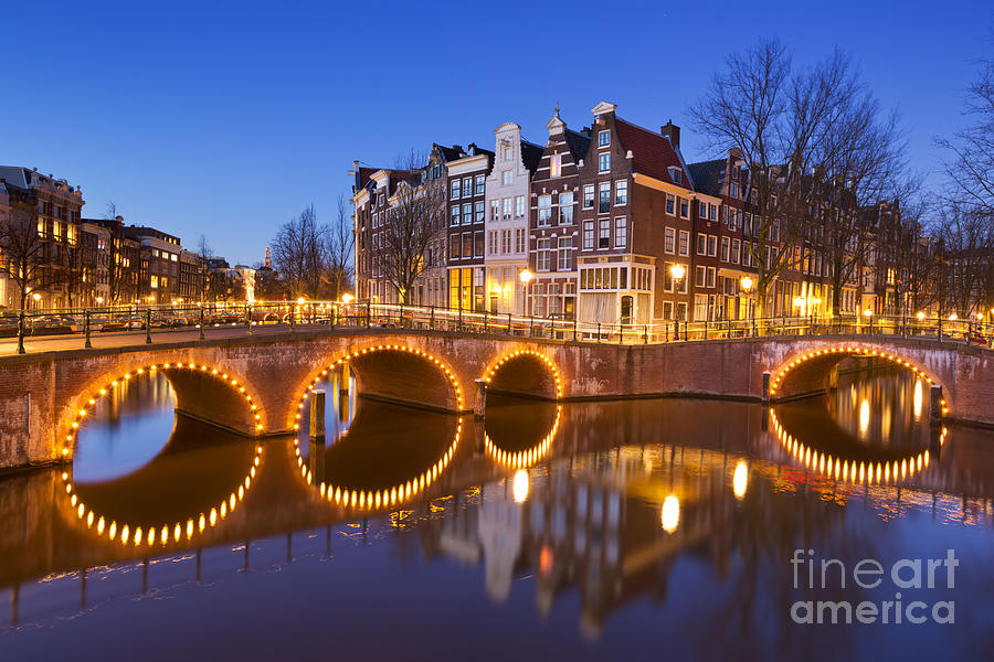 Architecture Photograph - Bridges over canals in Amsterdam at night by Sara Winter