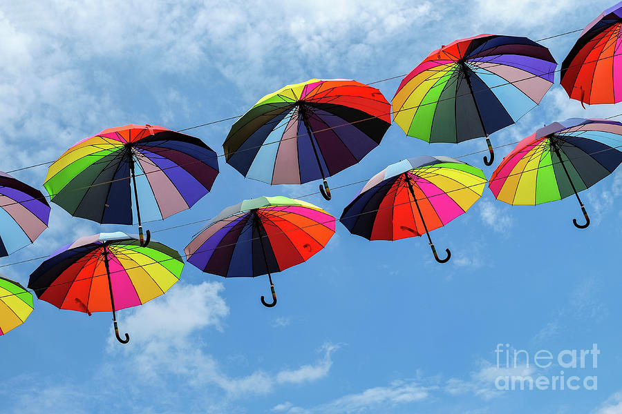 Bright colorful umbrellas  Photograph by Iryna Liveoak