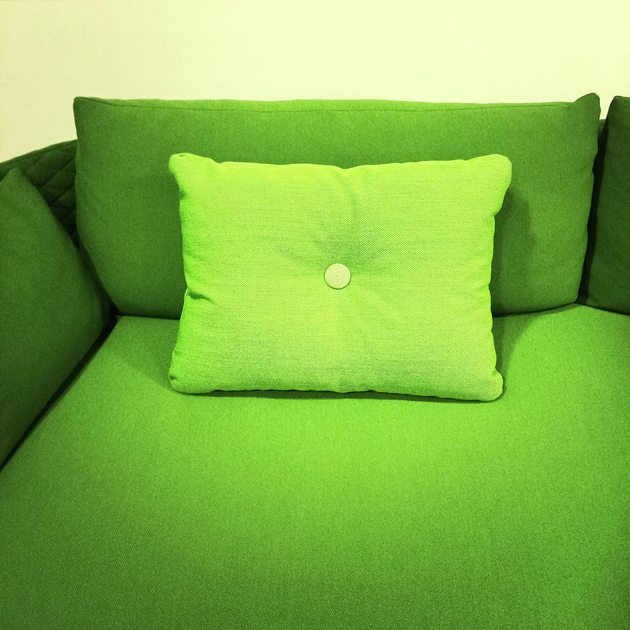 Furniture Photograph - Bright green sofa with cushion by GoodMood Art