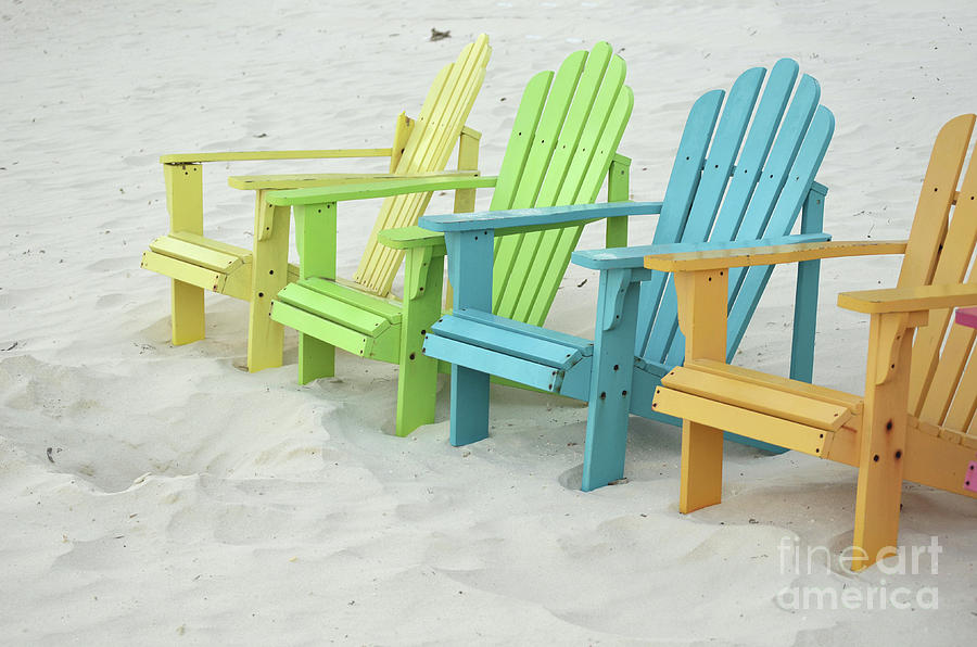 Bright Pastel Colored Adirondak Chairs on a White Sand Beach Photograph by DejaVu Designs