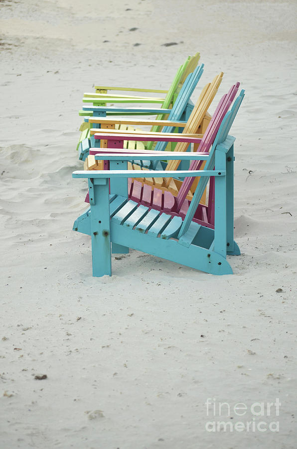 Bright Pastel Colored Chairs on a White Sand Beach Photograph by DejaVu Designs