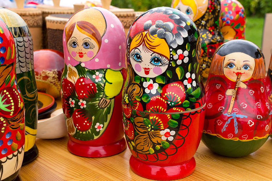 Bright Russian Matrushka puzzle Dolls Photograph by John Williams