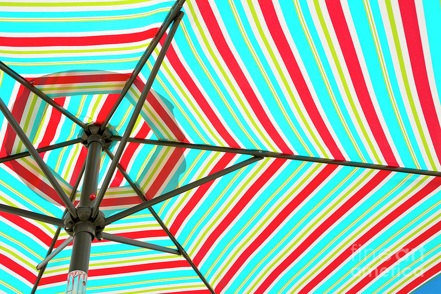 Bright Striped Beach Umbrella Photograph by Maria Janicki