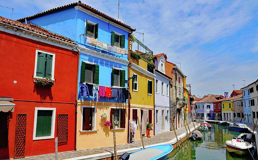 Brightly Colored Houses Along A Canal On The Island Of Burano, Italy Photograph by Rick Rosenshein