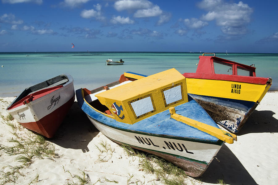 Boat Photograph - Brightly Painted Fishing Boats Aruba by George Oze