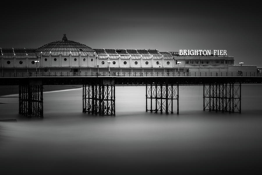 Black And White Photograph - Brighton Pier, England by Ivo Kerssemakers