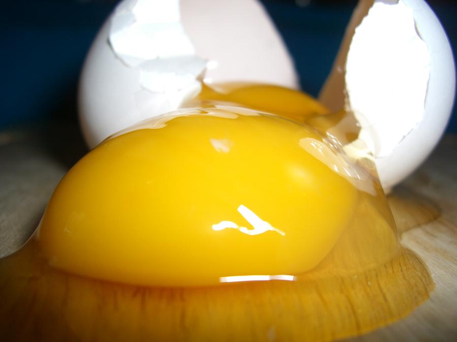 Chicken Photograph - Broken Double Yolk Egg by Sin Lanchester