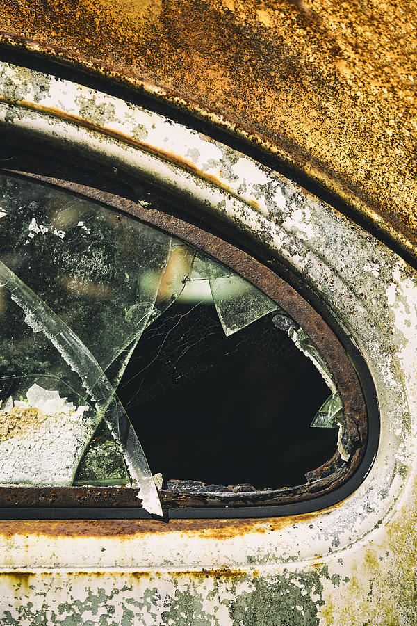 Car Photograph - Broken window on a rusty scraped classic car by Russ Dixon