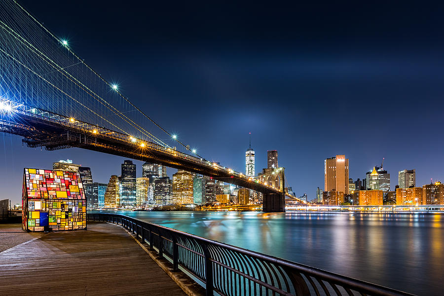 Brooklyn Bridge and the Lower Manhattan skyline by night Photograph by Mihai Andritoiu