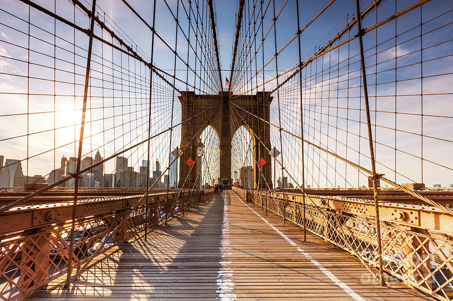 Brooklyn bridge at sunset, New York, USA Photograph by Matteo Colombo