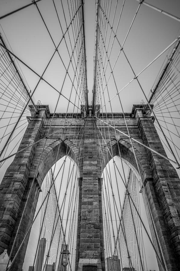 Black And White Photograph - Brooklyn Bridge Goes Up by Brandi Fitzgerald