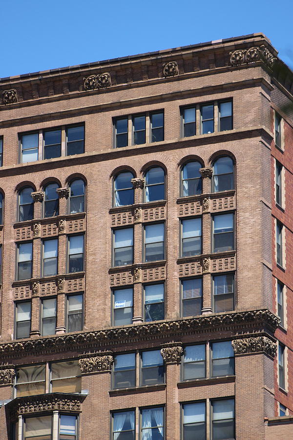 Brownstone Buildings with Ornate Trim Photograph by Colleen Cornelius