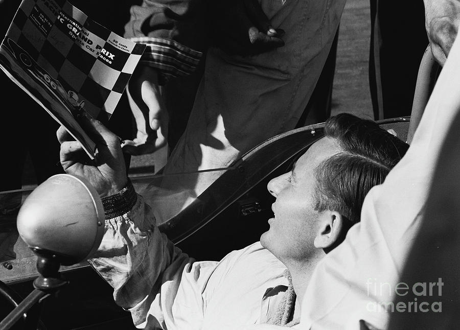 Bruce McLaren takes time for fan  Photograph by Robert K Blaisdell