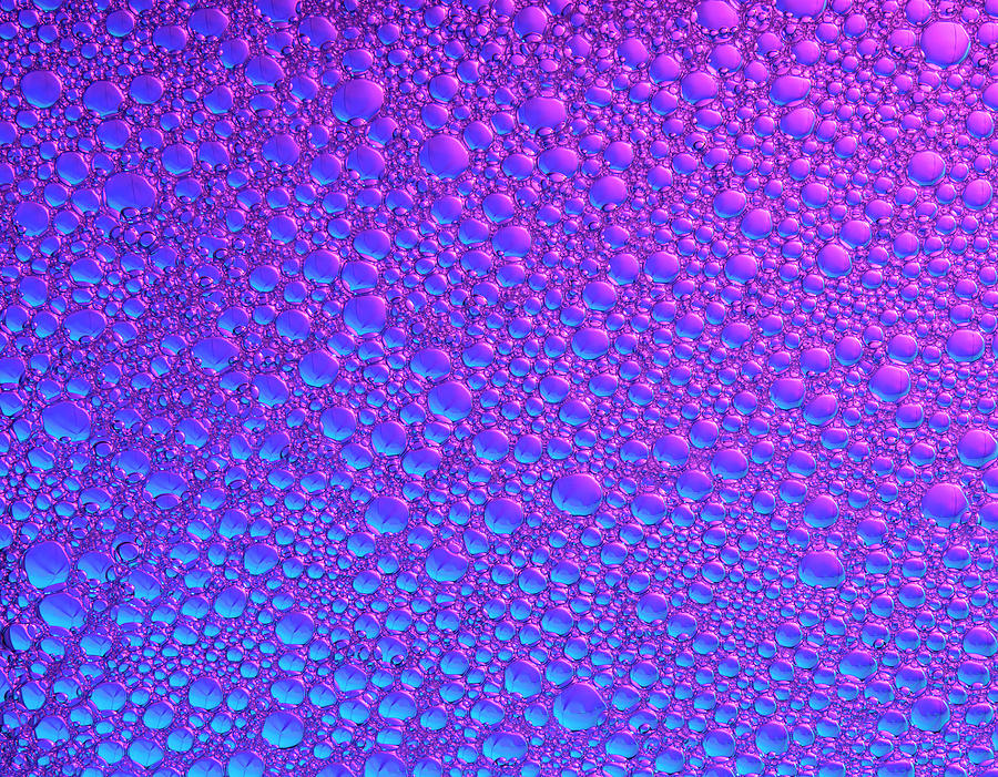 Bubbles In Blue And Red As Background Or Texture Photograph