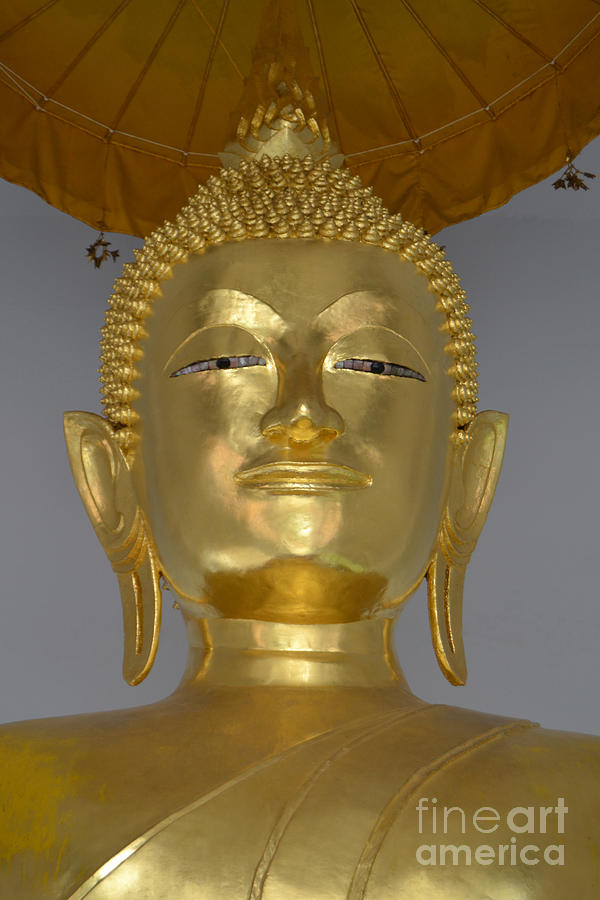 Buddha Face Under an Umbrella at the Golden Mount Photograph by Heather Kirk