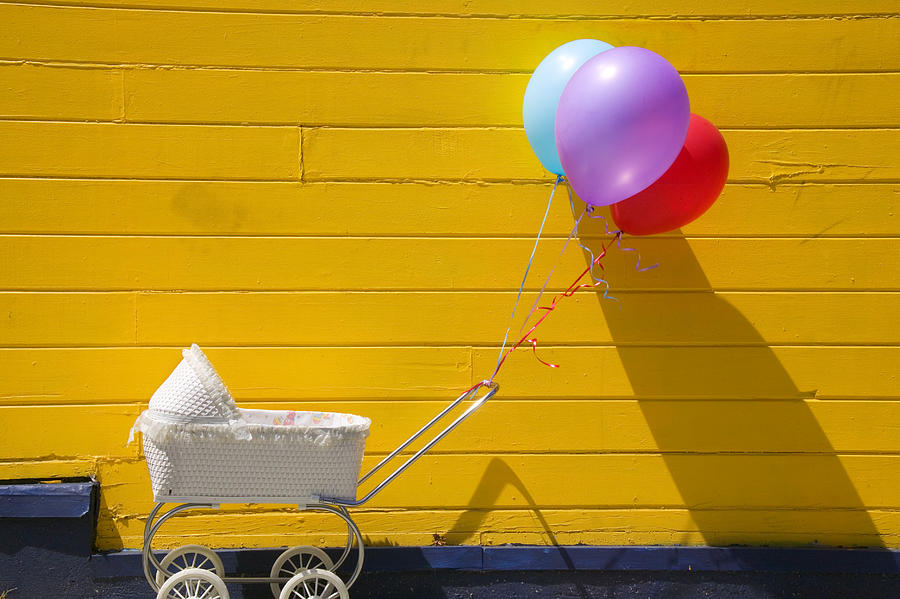 Still Life Photograph - Buggy and yellow wall by Garry Gay