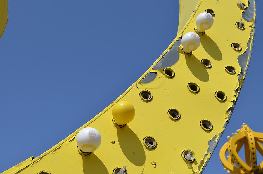 Bulbs on Yellow Sign Photograph by Erik Burg