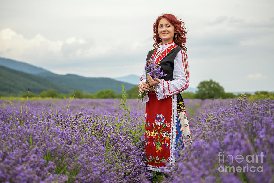 Flowers Still Life Photograph - Bulgarian girl in a lavender field by Nikolay Stoimenov