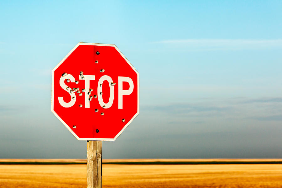 Stop Sign Photograph - Bullet Riddled by Todd Klassy