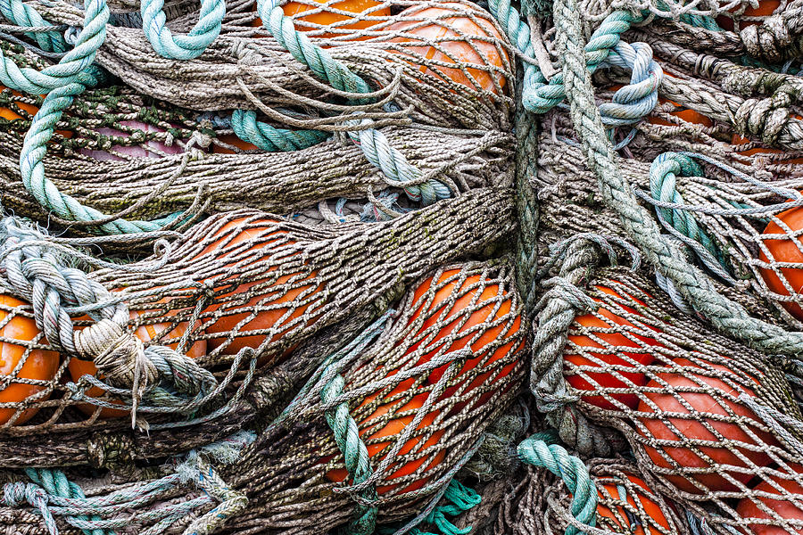Oregon Photograph - Bundle of Fishing Nets and Buoys by Carol Leigh