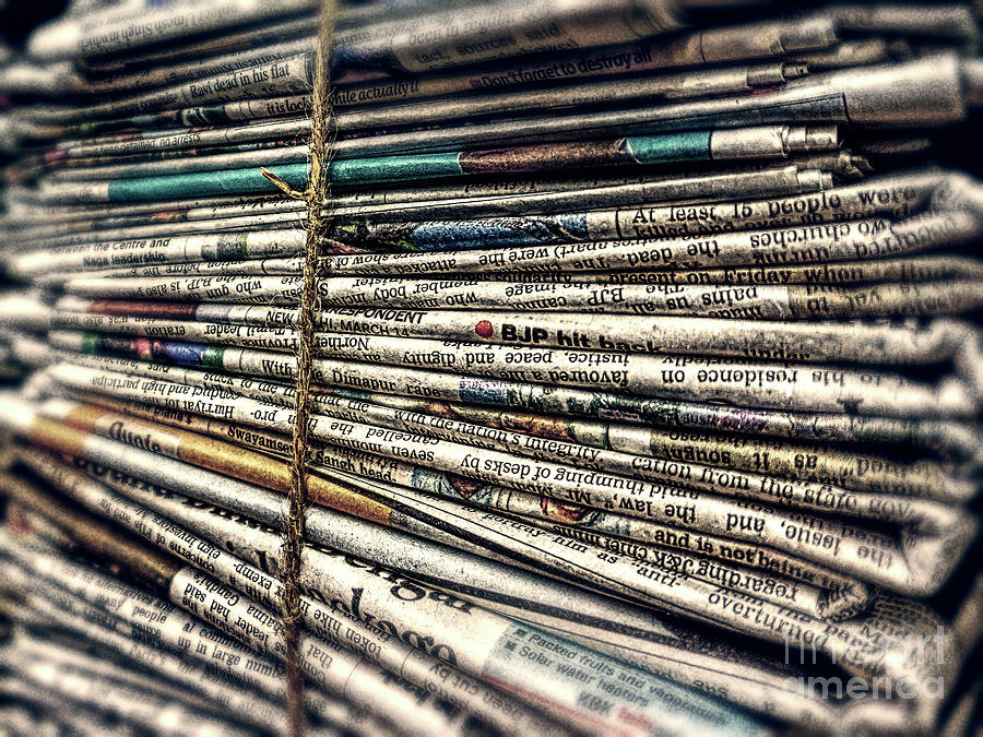Bundle of Newspapers Photograph by Phil Perkins