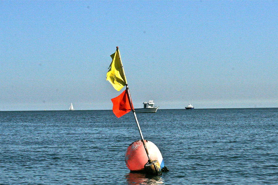 Buoy, Flags And Boats Photograph by Steve Swindells - Pixels