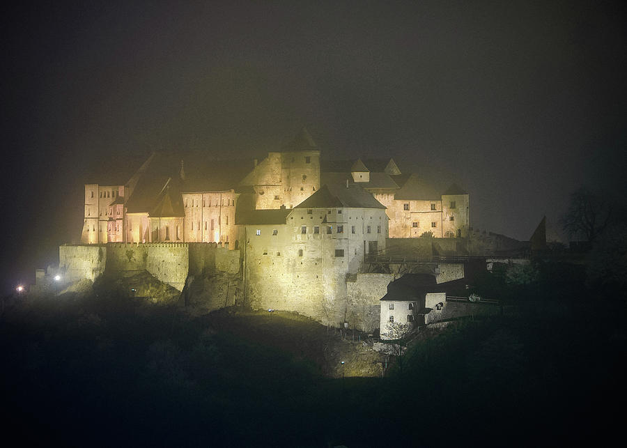 Burghausen Castle at night in Fog Photograph by Alexander Kunz