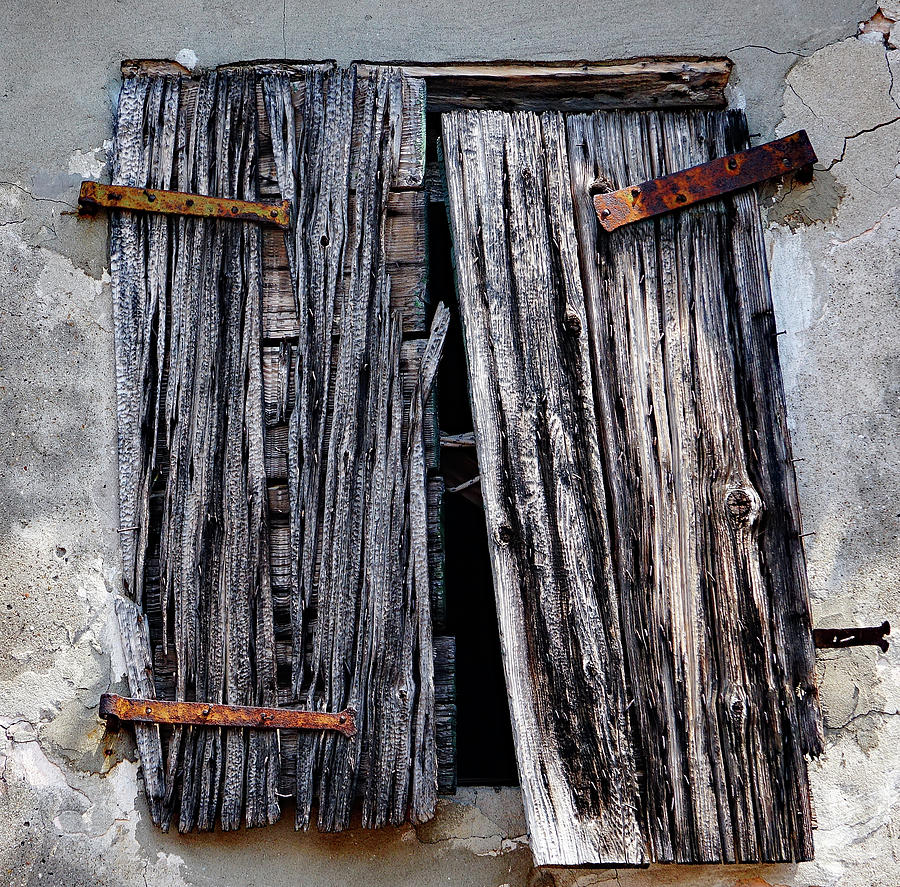 Burnt Window Shutters With Rusted Hardware On The Island Of Burano, Italy Photograph by Rick Rosenshein