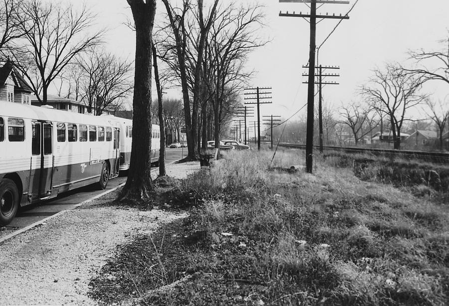 Bus Alongside Chicago and North Western Tracks  Photograph by Chicago and North Western Historical Society