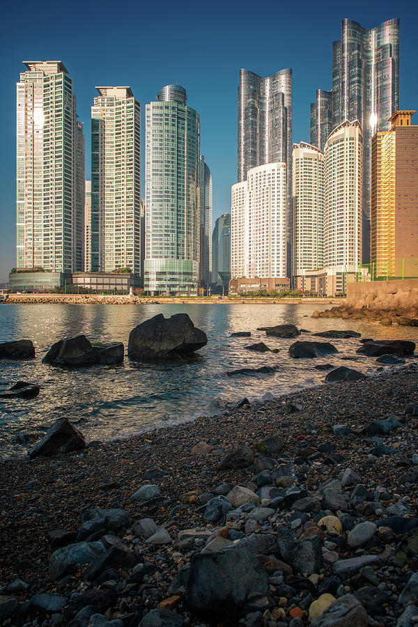 Architecture Photograph - Busan city building and sand beach by Anek Suwannaphoom