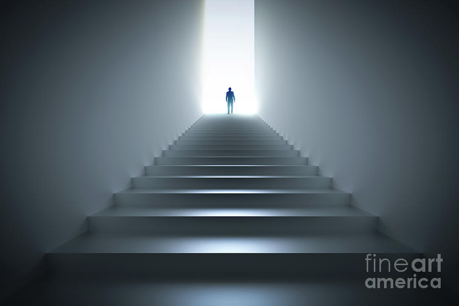 Businessman climbing the stairs towards light. Photograph by Michal Bednarek