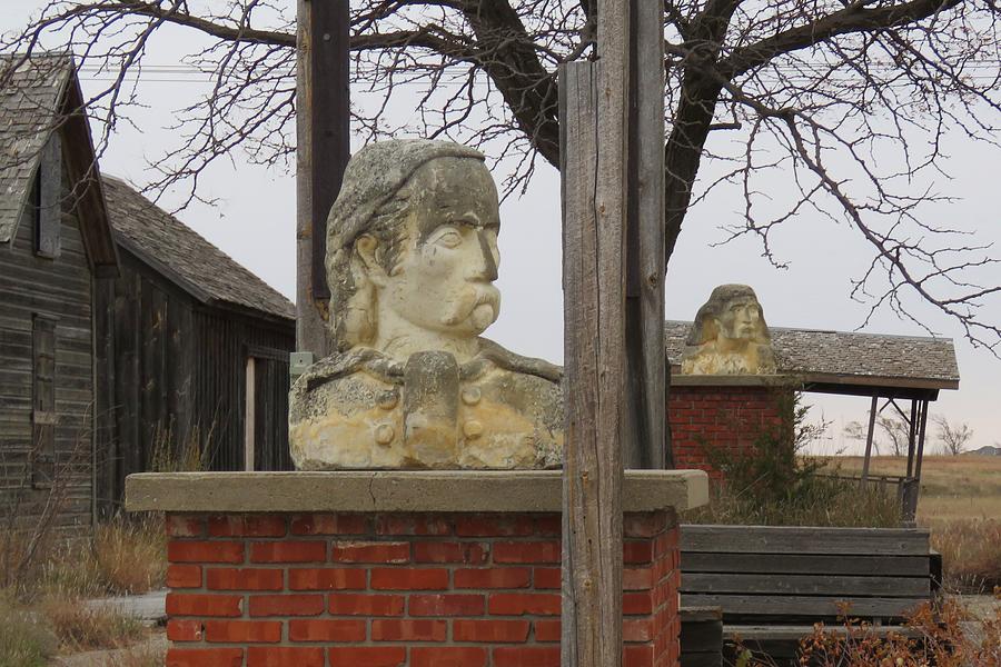 Busts in Frontier City Photograph by Keith Stokes