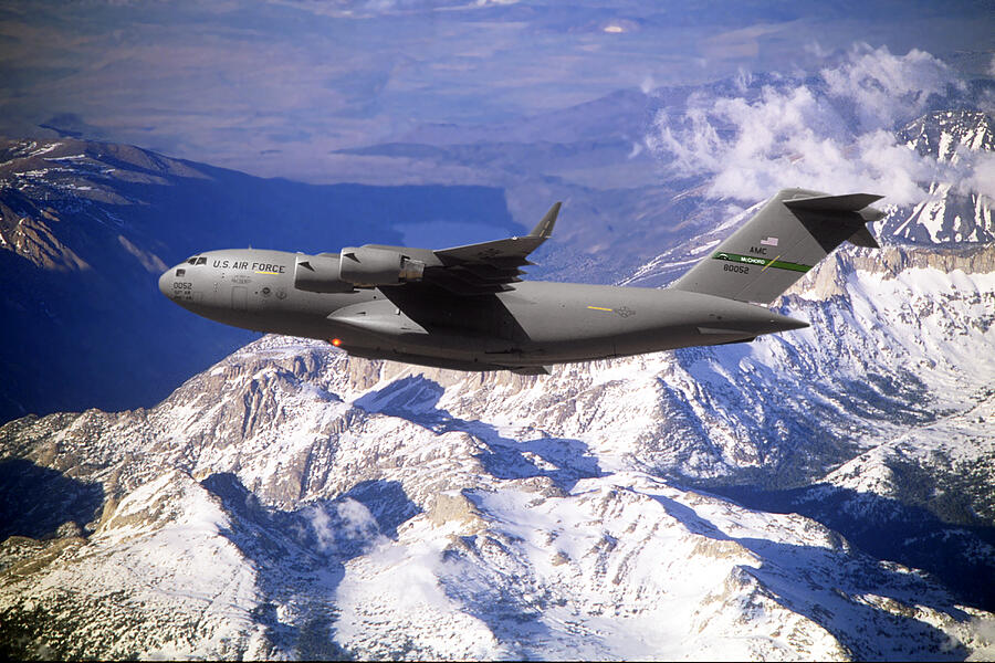 C-17 Globemaster III Over Snow Capped Mountains Mixed Media by Erik Simonsen